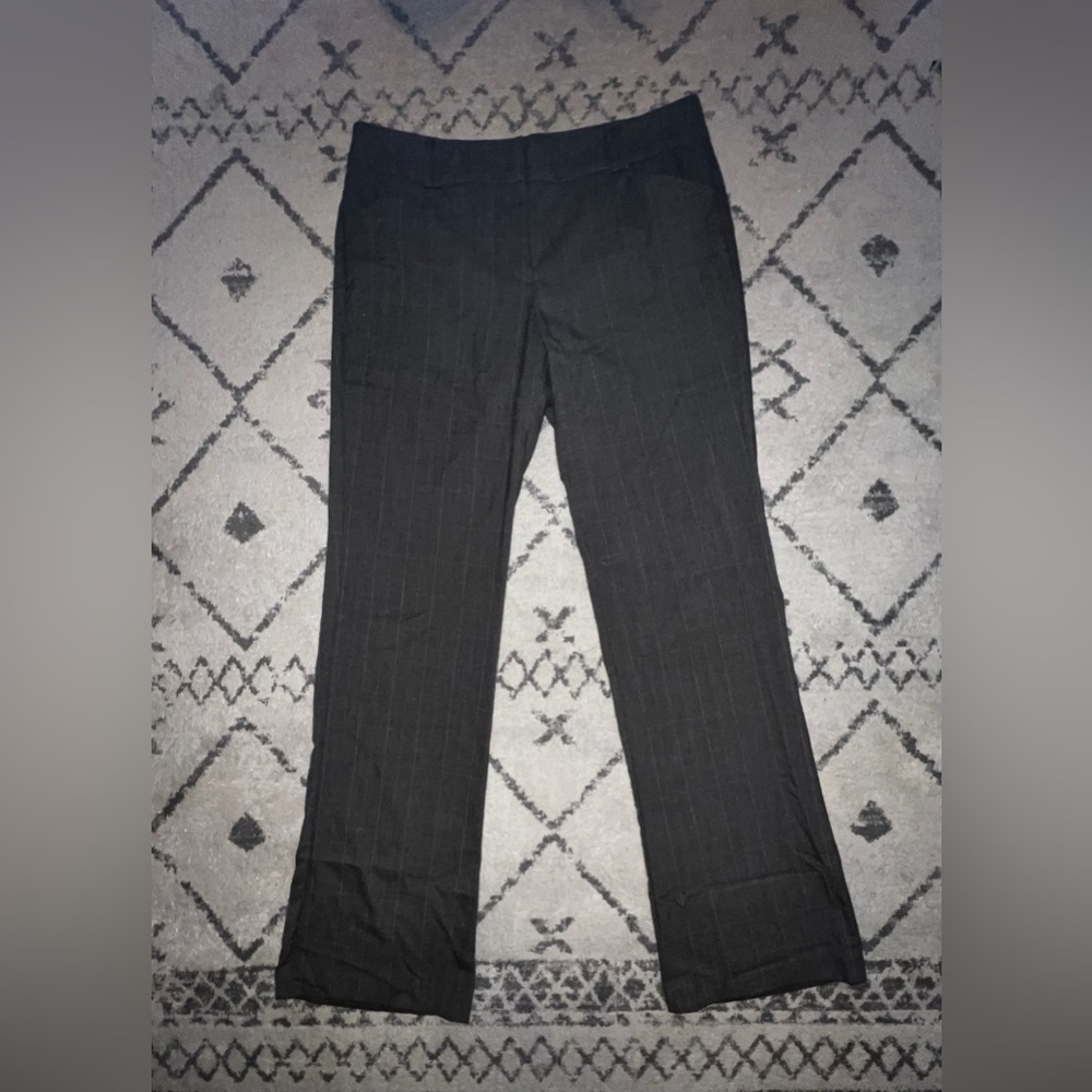 Woman’s gray striped pants